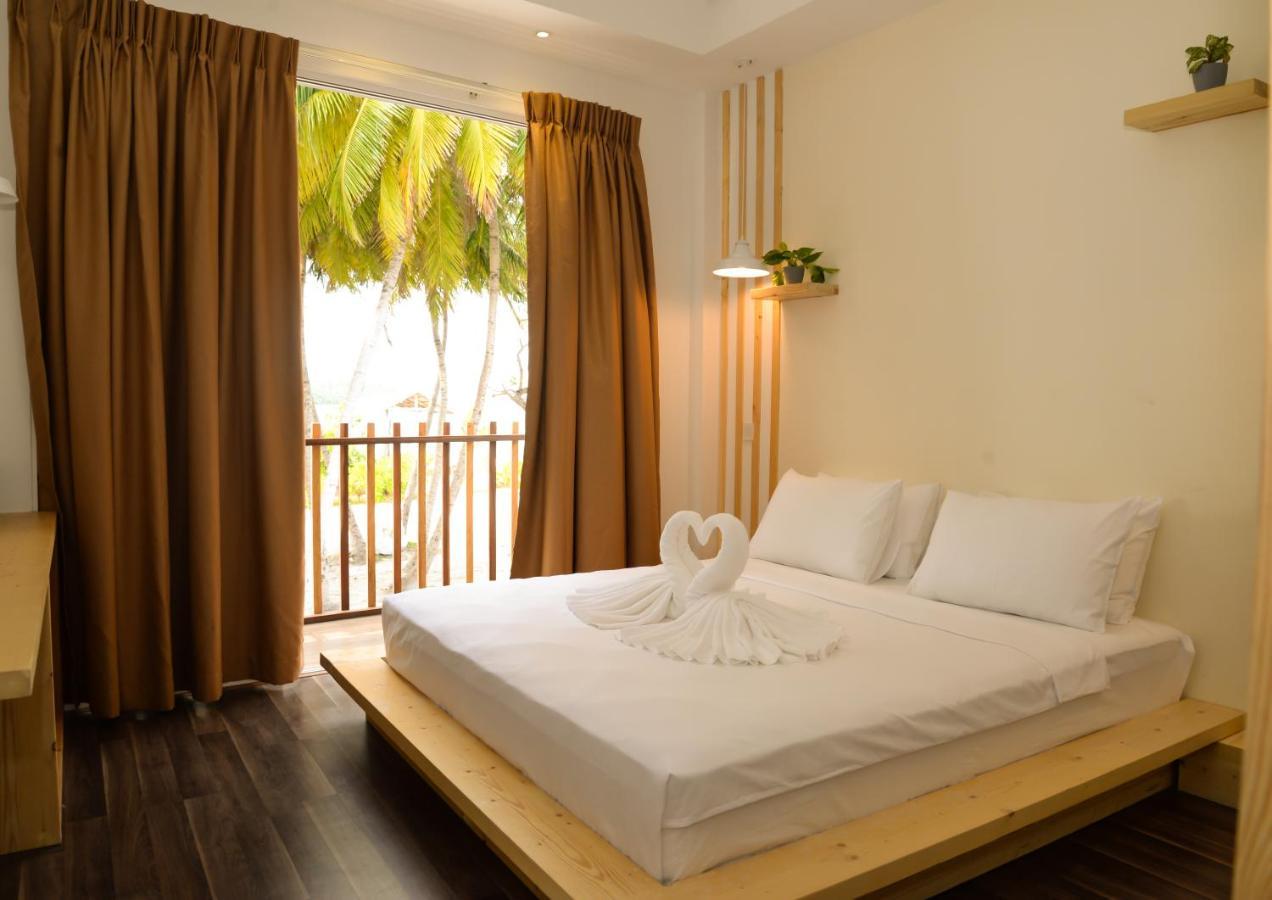 Portia Hotel & Spa Dhiffushi Bagian luar foto