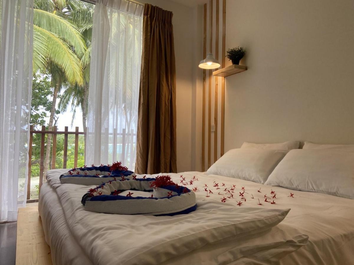 Portia Hotel & Spa Dhiffushi Bagian luar foto