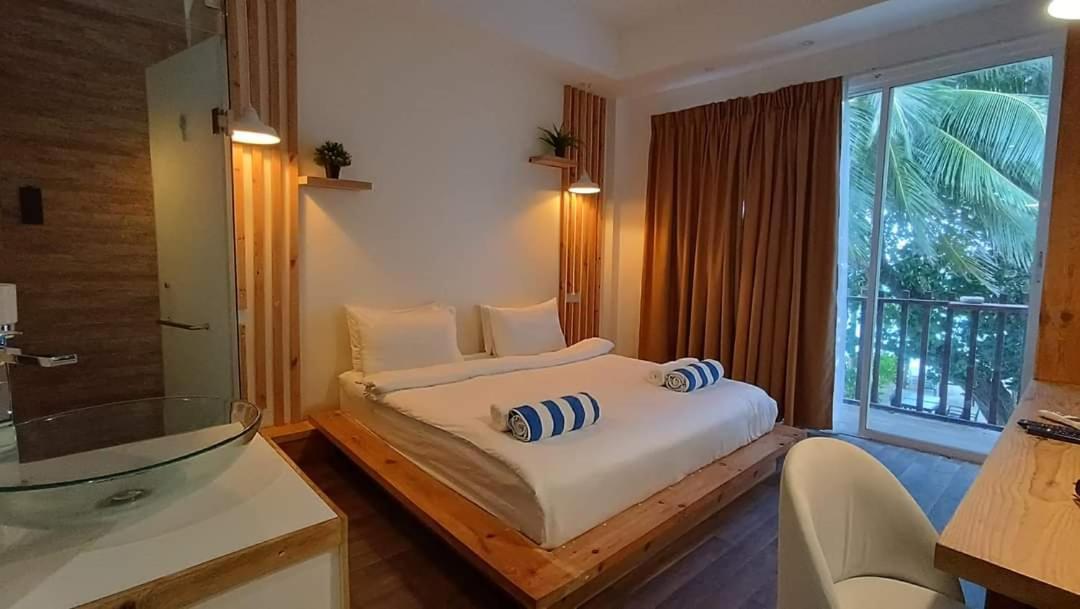 Portia Hotel & Spa Dhiffushi Bagian luar foto
