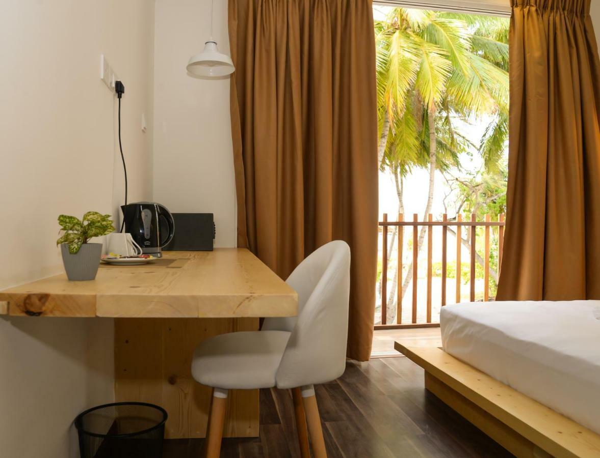 Portia Hotel & Spa Dhiffushi Bagian luar foto